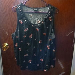 Torrid, sleevless shirt, black with floral pattern, size 2